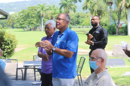 Peter Lindo (Member of Organizing Committee of 2023 Jamaica Open) applauds at recent Press Briefing at Constant Spring Golf Club