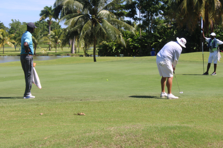 Allan Mclean sinks his putt for a Birdie on hole 1 at the Jamaica Open