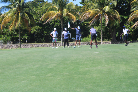 Group of Shkelqim Kukaj, Mark Newham and Luther Thompson battle at the 3rd hole on Day 1 of the Jamaica Open